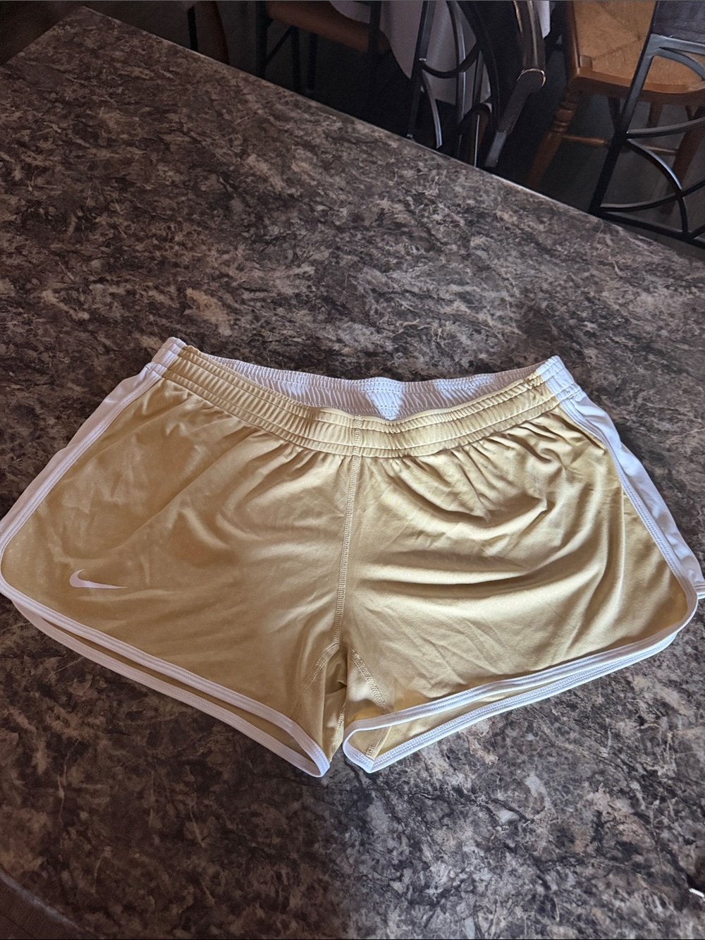 Nike Women's Pale Yellow Athletic Shorts with White Trim